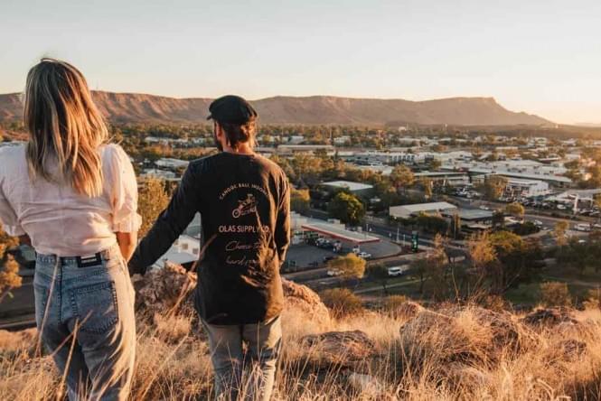 Couple on ANZAC hill overlooking Alice Springs